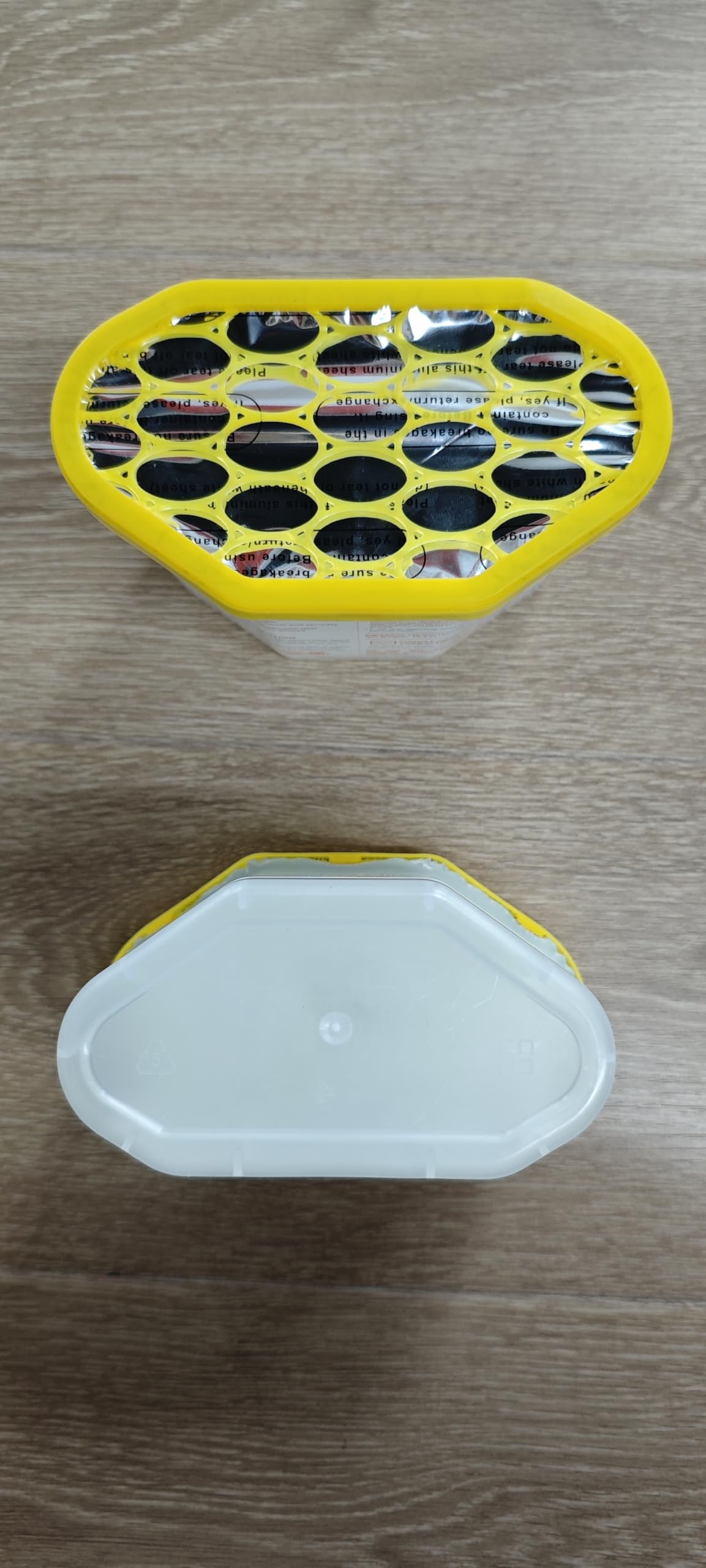Hand holding Vacplus for scale showing portable size and convenience benefit