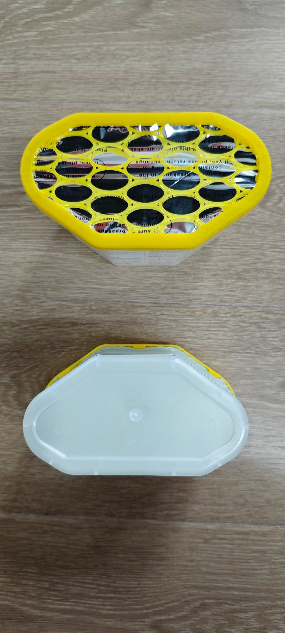 Hand holding Vacplus for scale showing portable size and convenience benefit