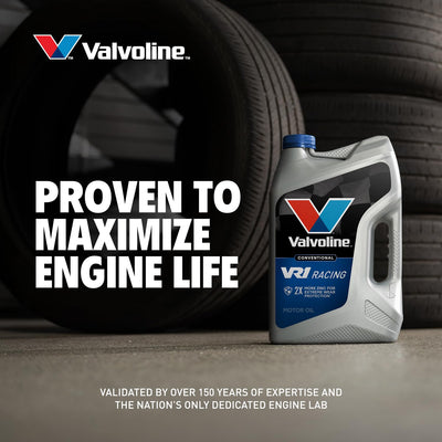 Valvoline VR1 bottle in a race garage setting suggesting motorsports-ready performance