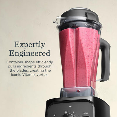 Vitamix VX1 blending a vibrant smoothie in container showing smooth, consistent results