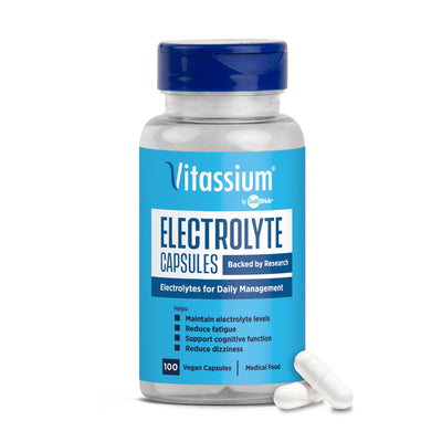 Vitassium frasco frontal con tapa abatible mostrando 100 cápsulas y conveniencia