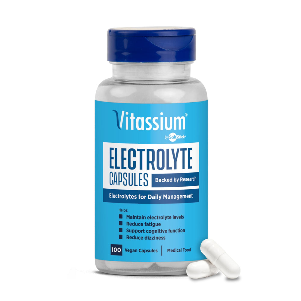 Vitassium frasco frontal con tapa abatible mostrando 100 cápsulas y conveniencia