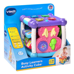 VTech cubo junto a pilas AAA para escala y nota de inclusión de demo