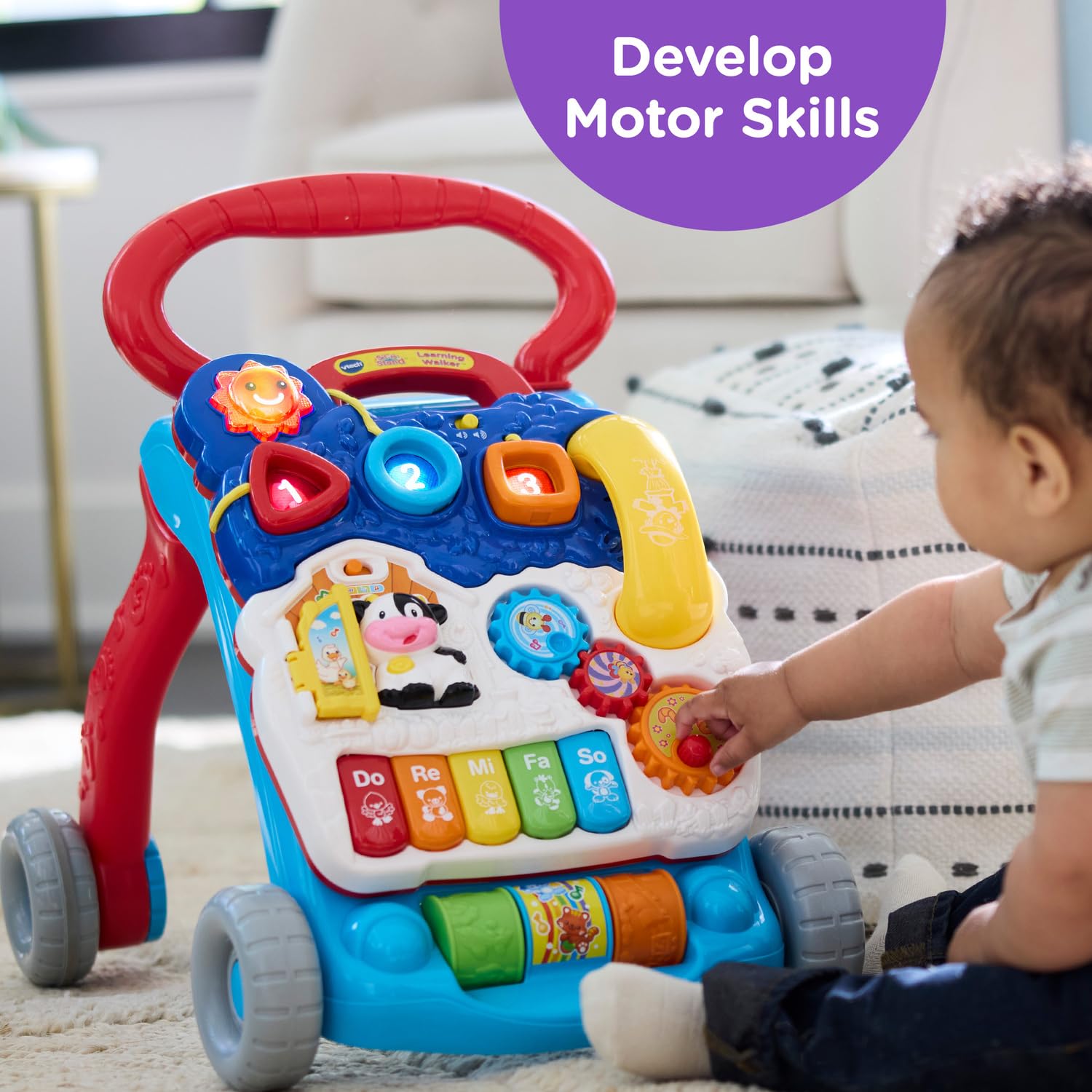 VTech colorful rollers and spinning gears improving hand coordination and tactile exploration