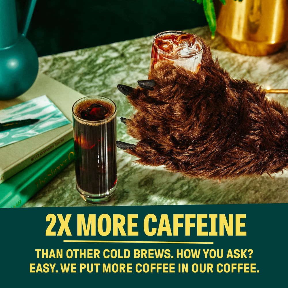 Wandering Bear pouring straight black cold brew over ice for refreshing energy