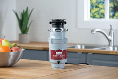 Waste King detalle de impulsadores de acero inoxidable para menos atascos