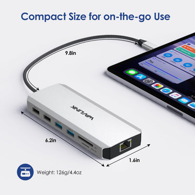 WAVLINK held in hand to show compact size and portable docking convenience