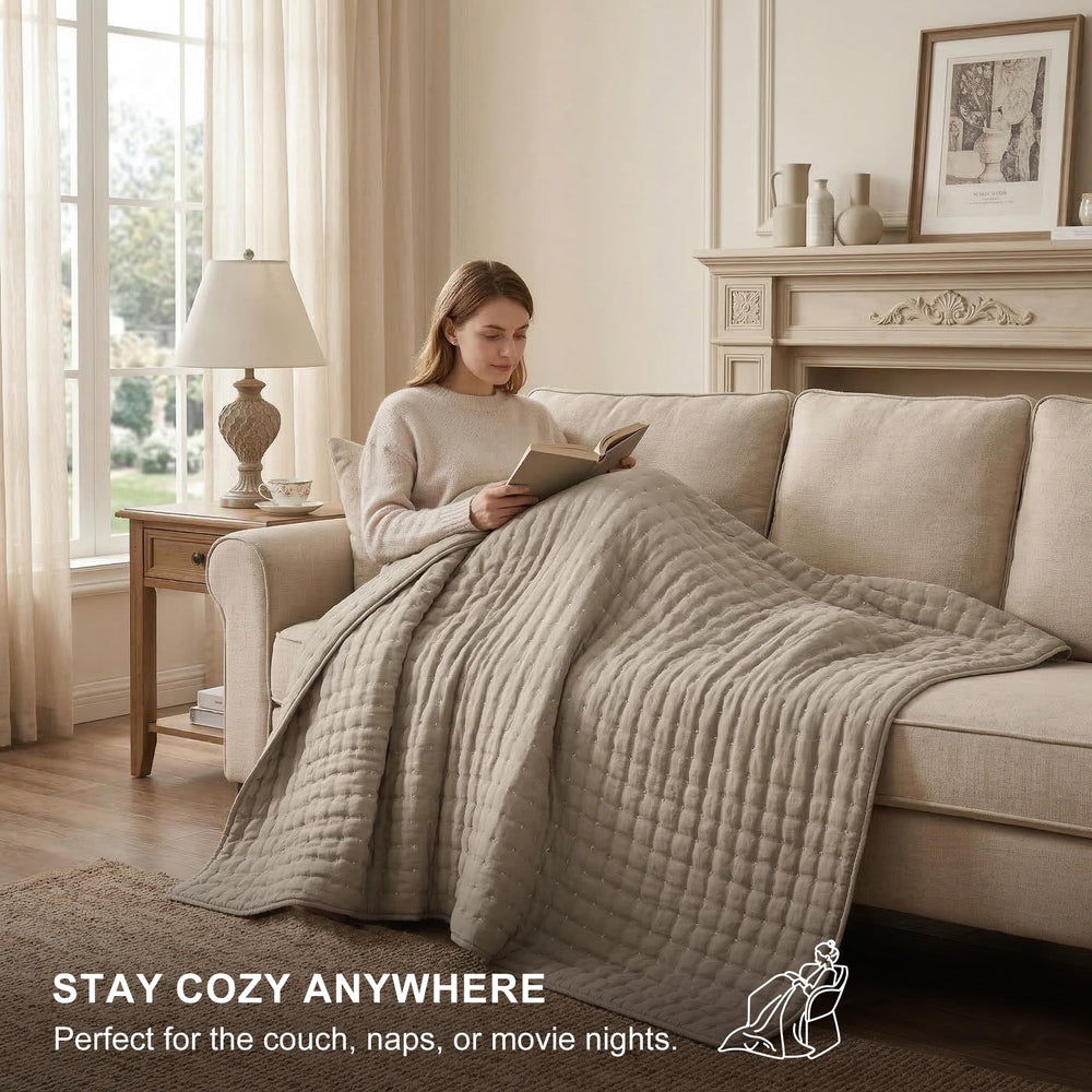 WDCOZY styled bedroom with quilted bedspread showing versatile neutral design