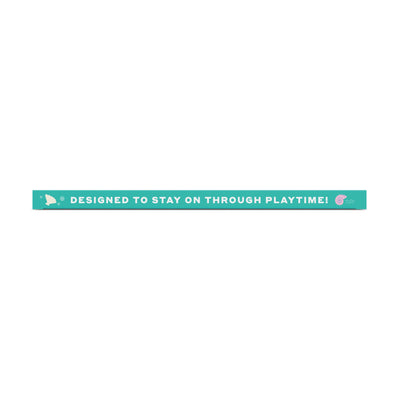 Welly en bolsa de picnic junto a juguetes, protección lista para la aventura