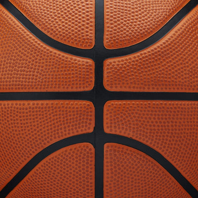 WILSON basketball in pickup game scene illustrating real-world outdoor use