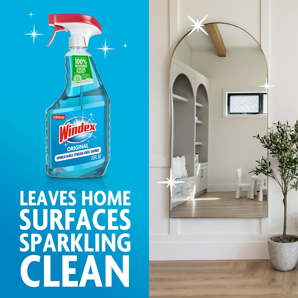 Windex gota del líquido mostrando textura y acción sobre manchas