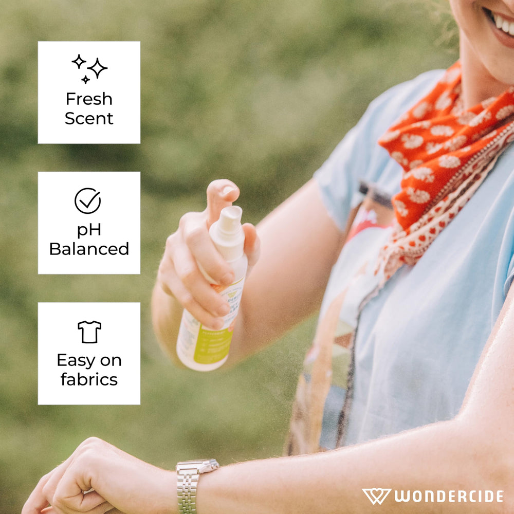 Wondercide lemongrass bottle staged in backyard illustrating outdoor protection