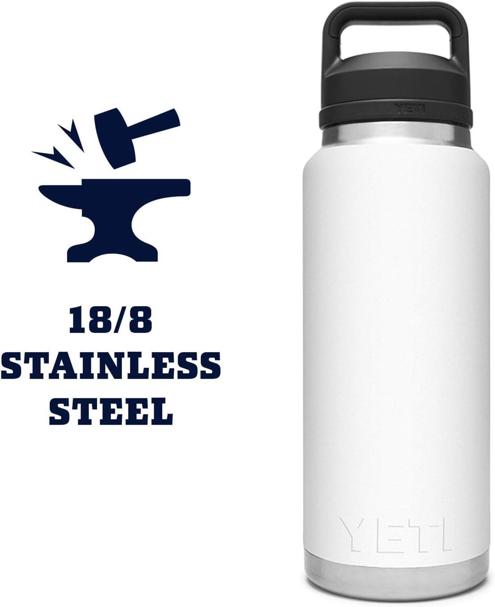 YETI Rambler navy on a hiking trail demonstrating outdoor-ready hydration