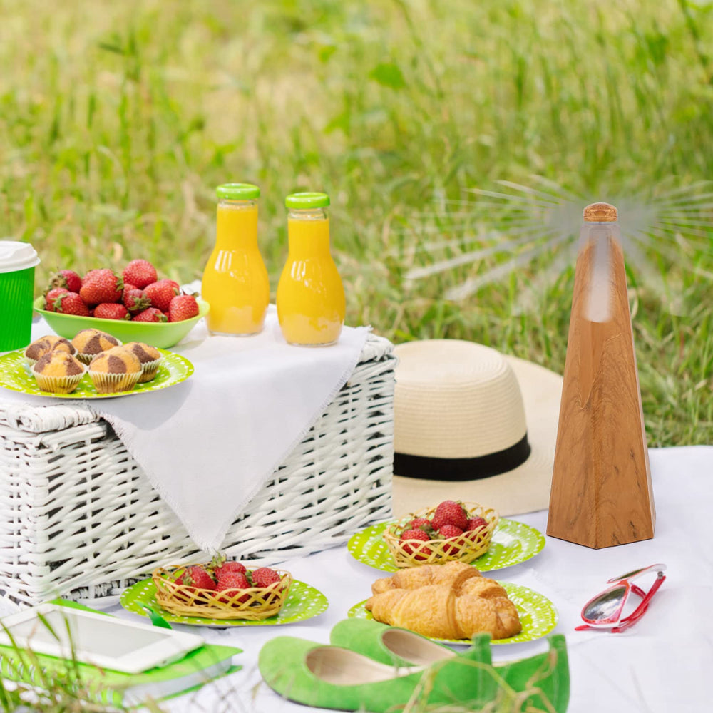 Yoiemivy ventilador en uso sobre mesa de picnic evitando insectos
