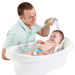 Yookidoo in-use tub rinse demonstrating controlled flow and safe support during bathing benefit