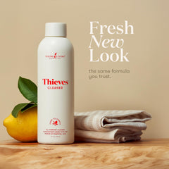Young Living Thieves en uso con pulverizador limpiando superficie, aplicación práctica