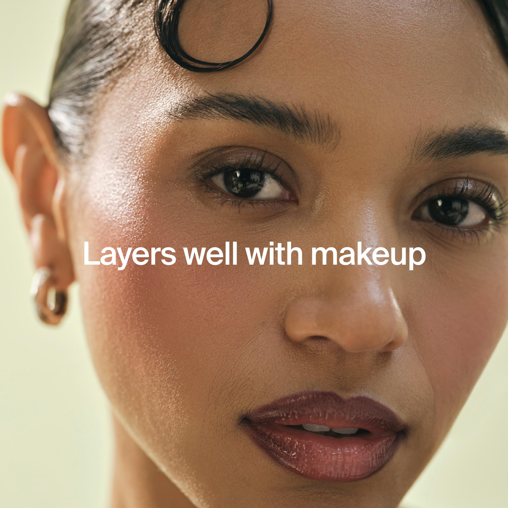Youth To The People cream swirled on skin showing dewy finish and plumping benefit