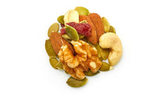 Yupik close-up of cashews almonds walnuts seeds and cranberries texture