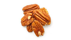 Yupik pecan halves close-up highlighting crunchy texture and freshness