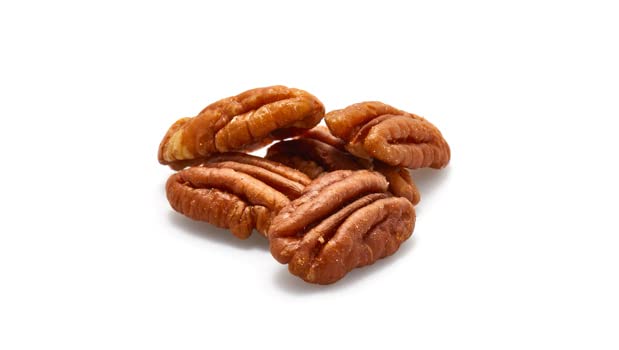 Yupik pecans in wooden bowl ready to eat for healthy snacking