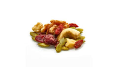 Yupik trail mix in bowl beside yogurt showing crunchy topping versatility