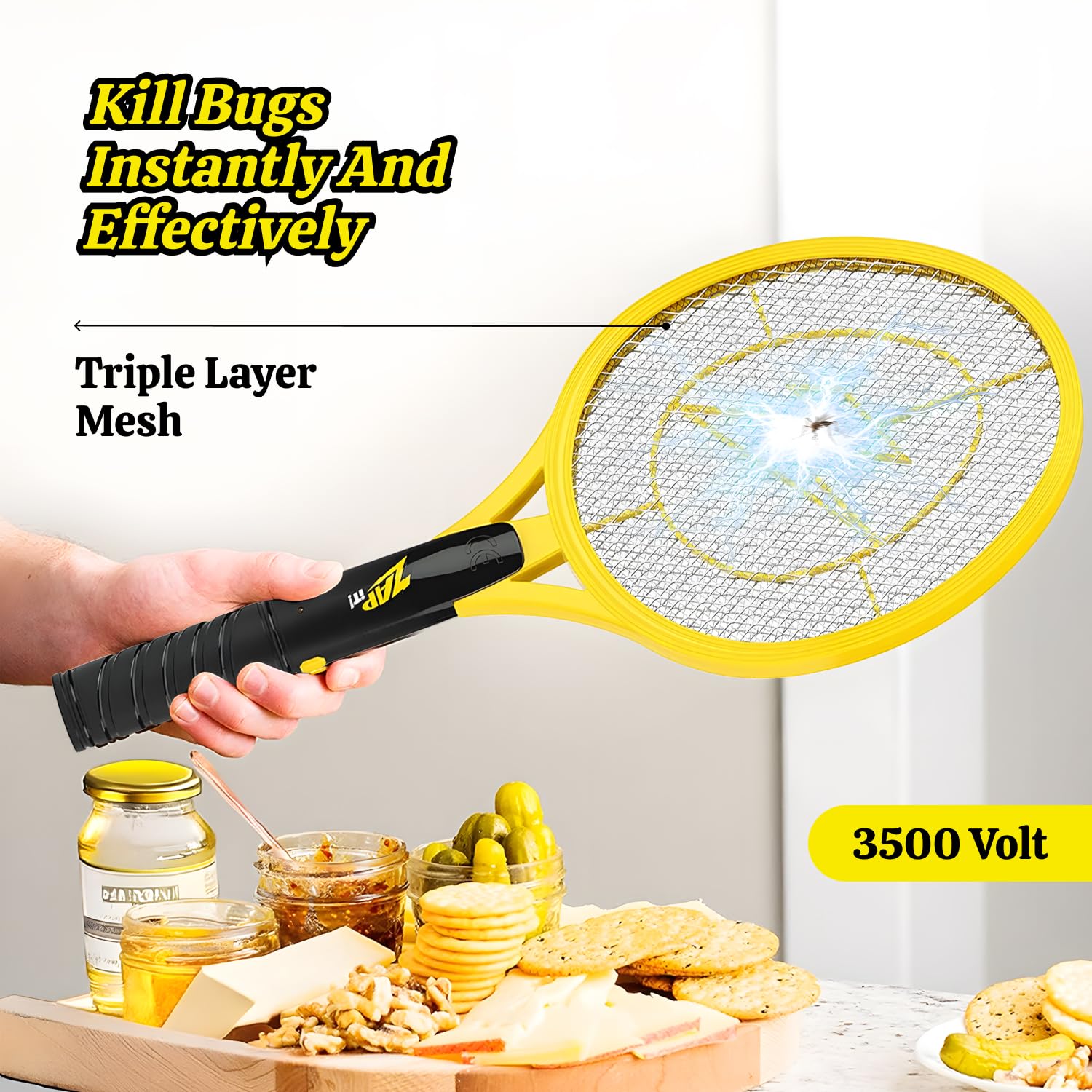 ZAP IT! racket held in hand demonstrating comfortable size and control