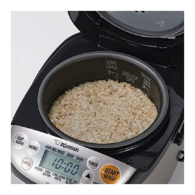 Zojirushi retractable power cord stowed neatly to reduce clutter and simplify storage