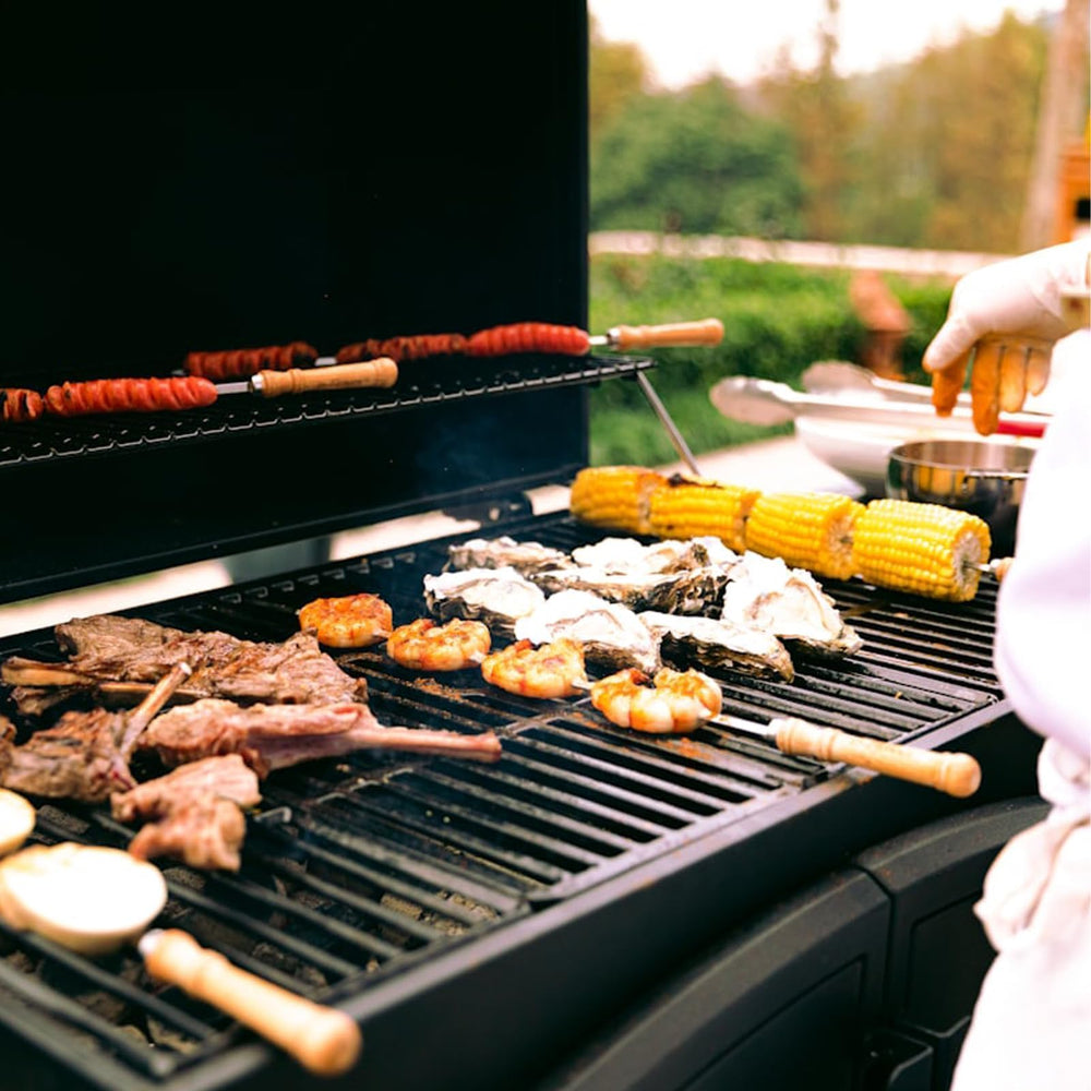 ZWYSLFCY cubeta instalada en parrilla Traeger para manejo seguro
